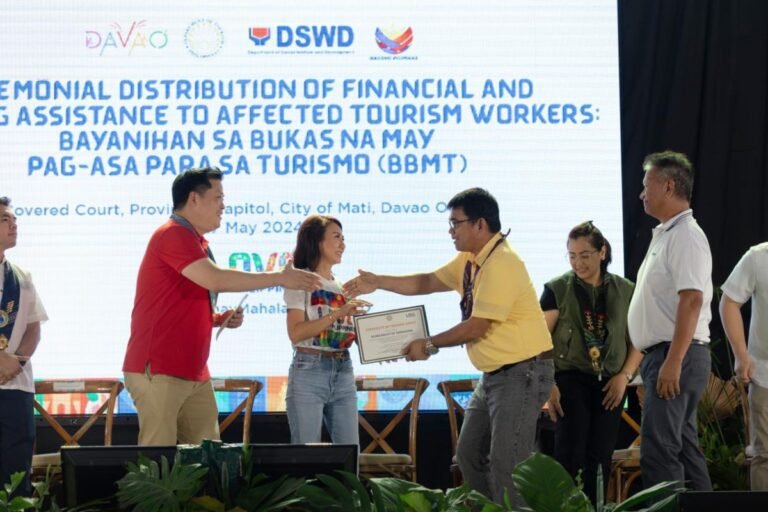 DOT, DSWD distributes aid to tourism workers in Davao Oriental